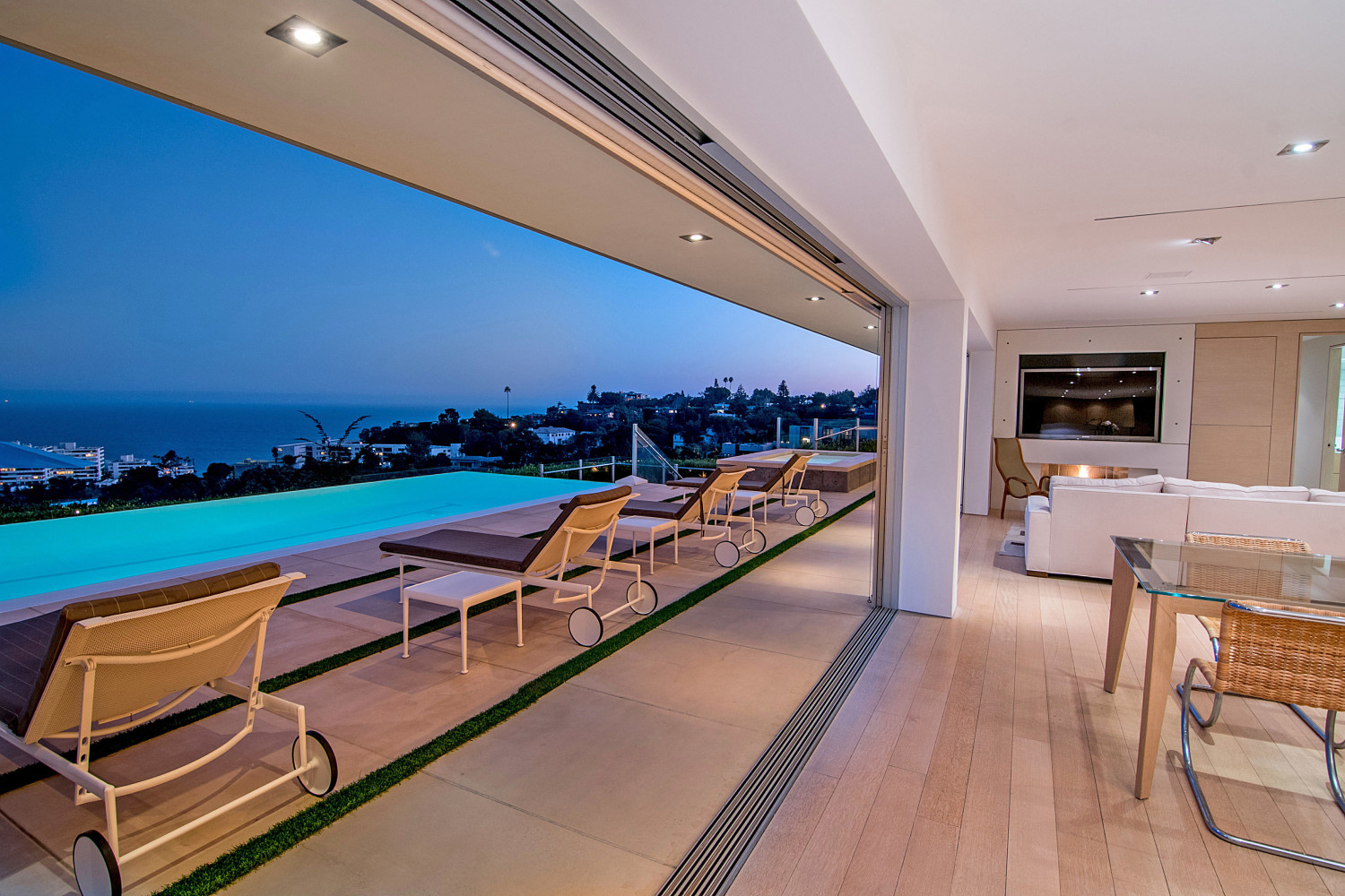 Resort-style swimming pool at the Modern Pacific Palisades Event Estate overlooking the Pacific Ocean