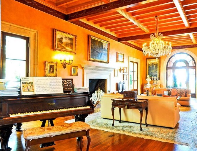 Elegant living room featuring exposed wood beam ceilings, a fireplace, grand piano, and Spanish Colonial architecture. Family Room Title Family Room with Pool Access Alt Comfortable family room opening to the pool terrace through arched French doors. Formal Entry Hall Title Spanish Colonial Grand Entry Alt Grand entry hall with terracotta floors, sweeping staircase, crystal chandelier, and handcrafted architectural details. Reception Hall Title Formal Reception Hall Alt Elegant reception hall with high ceilings, terracotta floors, antique furnishings, and natural light. Formal Dining Room Title Formal Dining Room Alt Sophisticated dining room featuring terracotta flooring, crystal chandeliers, and classic Spanish Colonial details. Formal Lawn Title Expansive Estate Lawn Alt Large manicured lawn surrounded by mature trees, ideal for private outdoor gatherings. Estate Grounds Title Private Estate Grounds Alt Beautifully landscaped grounds with mature trees, open lawns, and peaceful garden spaces. Tree-Lined Drive Title Private Tree-Lined Driveway Alt Private tree-lined driveway leading to a secluded Spanish Colonial estate. Recommended Gallery Order Hero aerial Front courtyard (day) Front courtyard (twilight) Sunset aerial Pool Covered loggia Living room Family room Grand entry Reception hall Dining room Estate lawn Estate grounds Tree-lined driveway Red Team Recommendation This estate feels historic, romantic, and timeless. Rather than emphasizing "luxury" repeatedly, position it as a Spanish Colonial estate rich in architectural character. Terms like Old World craftsmanship, Mediterranean elegance, handcrafted details, arched loggias, terracotta floors, lush grounds, and private hillside retreat will help this page stand apart from the more contemporary estates in your collection while attracting planners looking for a warm, classic California setting.