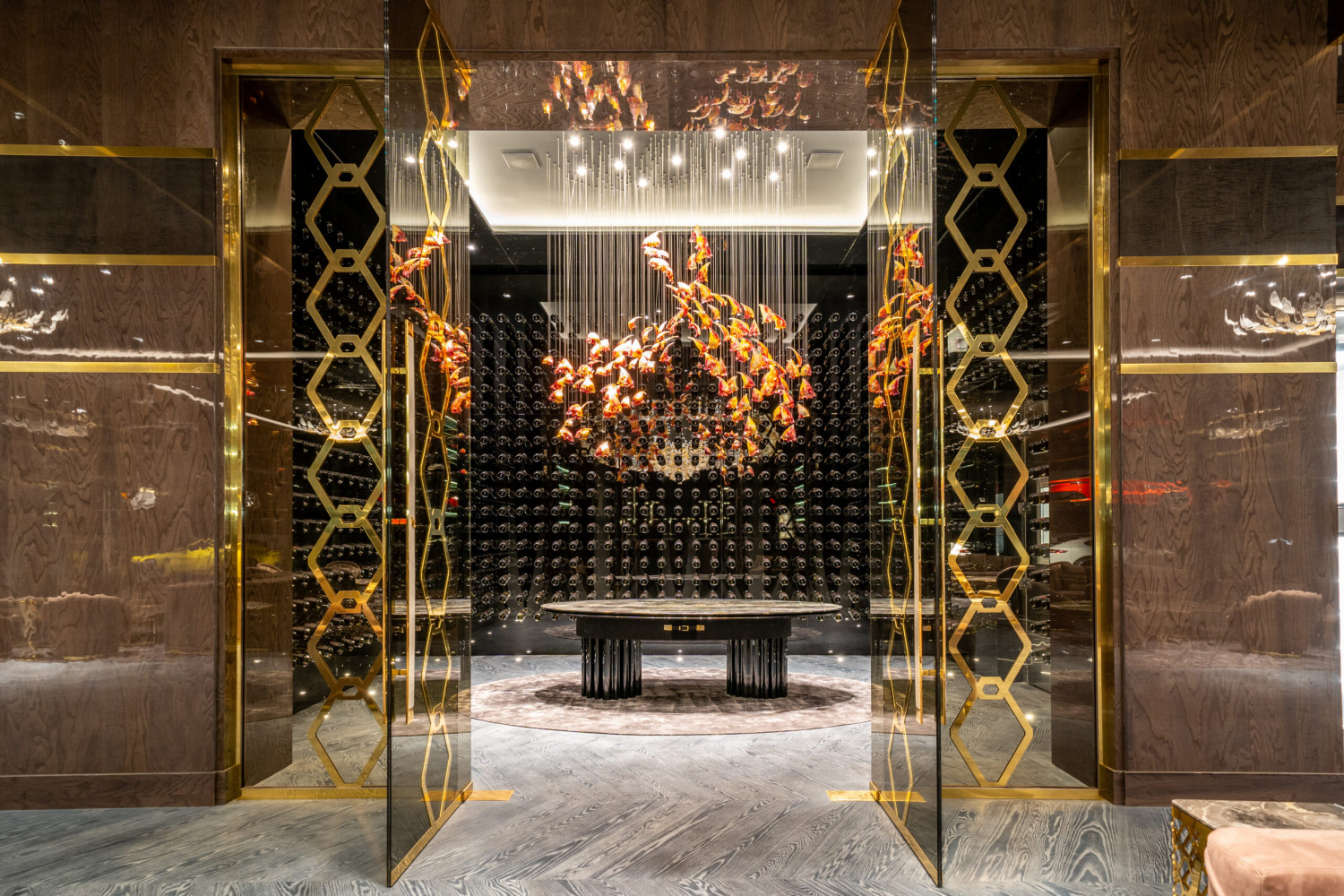 Designer wine cellar featuring custom wine storage, elegant lighting, and a sophisticated tasting room.