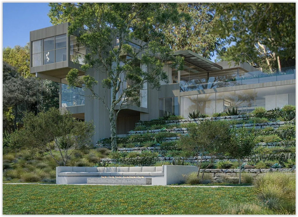 Contemporary Malibu estate with dramatic architecture, expansive glass walls, terraced landscaping, and scenic hillside surroundings