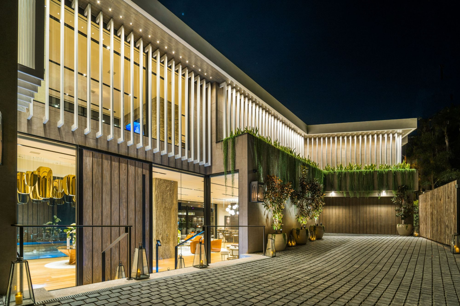 Modern architectural facade with dramatic evening lighting