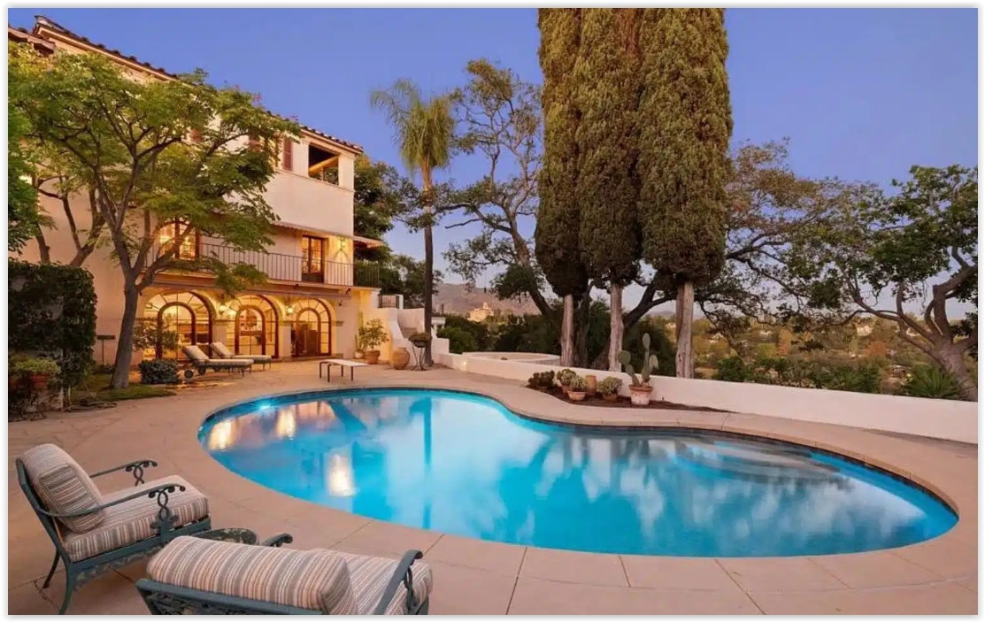 Private swimming pool overlooking mature landscaping and scenic hillside views at a Spanish Colonial estate. Loggia Title Covered Loggia and Outdoor Living Alt Covered Spanish Colonial loggia with arched columns, outdoor seating, and a fountain courtyard. Living Room Title Grand Living Room with Exposed Beams Alt Elegant living room featuring exposed wood beam ceilings, a fireplace, grand piano, and Spanish Colonial architecture. Family Room Title Family Room with Pool Access Alt Comfortable family room opening to the pool terrace through arched French doors. Formal Entry Hall Title Spanish Colonial Grand Entry Alt Grand entry hall with terracotta floors, sweeping staircase, crystal chandelier, and handcrafted architectural details. Reception Hall Title Formal Reception Hall Alt Elegant reception hall with high ceilings, terracotta floors, antique furnishings, and natural light. Formal Dining Room Title Formal Dining Room Alt Sophisticated dining room featuring terracotta flooring, crystal chandeliers, and classic Spanish Colonial details. Formal Lawn Title Expansive Estate Lawn Alt Large manicured lawn surrounded by mature trees, ideal for private outdoor gatherings. Estate Grounds Title Private Estate Grounds Alt Beautifully landscaped grounds with mature trees, open lawns, and peaceful garden spaces. Tree-Lined Drive Title Private Tree-Lined Driveway Alt Private tree-lined driveway leading to a secluded Spanish Colonial estate. Recommended Gallery Order Hero aerial Front courtyard (day) Front courtyard (twilight) Sunset aerial Pool Covered loggia Living room Family room Grand entry Reception hall Dining room Estate lawn Estate grounds Tree-lined driveway Red Team Recommendation This estate feels historic, romantic, and timeless. Rather than emphasizing "luxury" repeatedly, position it as a Spanish Colonial estate rich in architectural character. Terms like Old World craftsmanship, Mediterranean elegance, handcrafted details, arched loggias, terracotta floors, lush grounds, and private hillside retreat will help this page stand apart from the more contemporary estates in your collection while attracting planners looking for a warm, classic California setting.