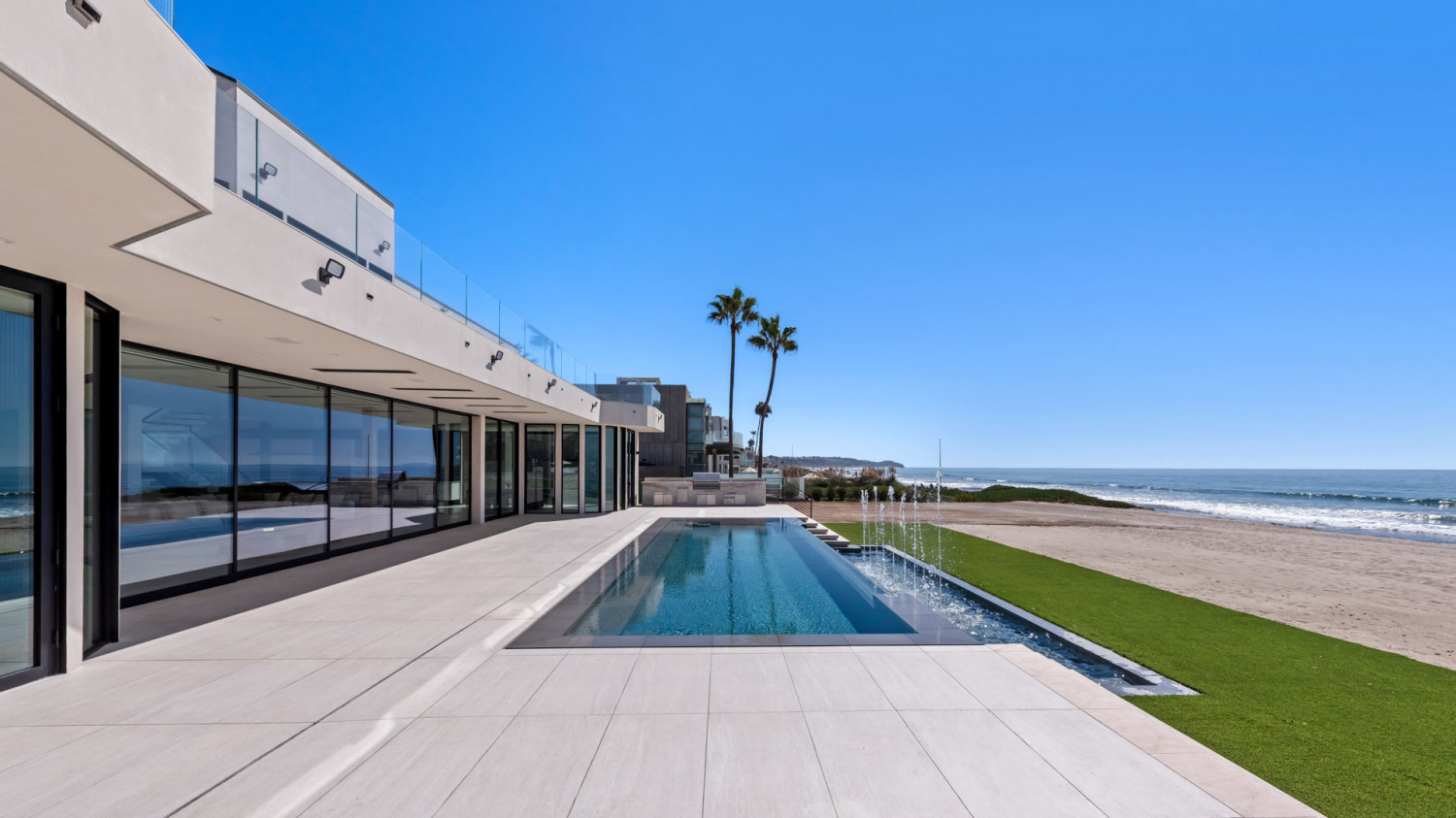Oceanfront luxury estate in Malibu with infinity pool and coas
