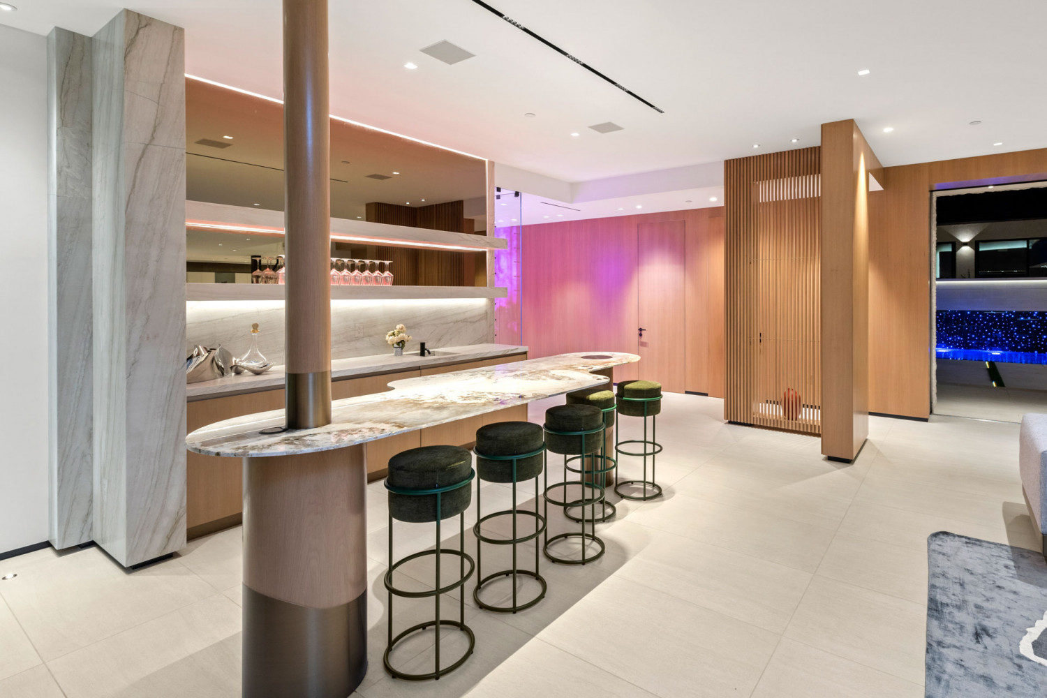 Modern bar area inside Malibu beachfront estate with contemporary design and ocean view setting