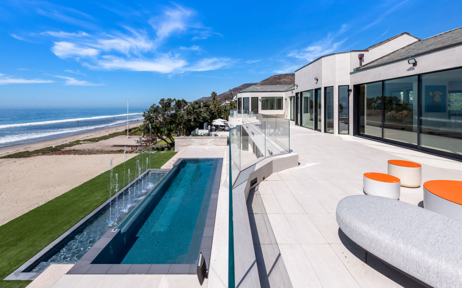 Modern Malibu estate pool and deck with oceanfront style outdoor living space