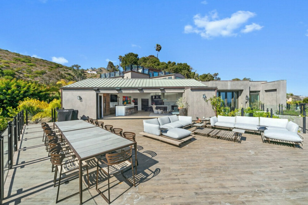 Expansive outdoor dining terrace at a luxury Malibu estate designed for weddings, private dinners, and special events.