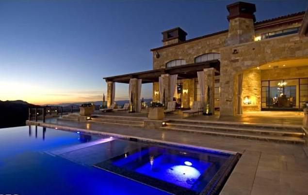 Infinity pool beside a Mediterranean-inspired Malibu private estate