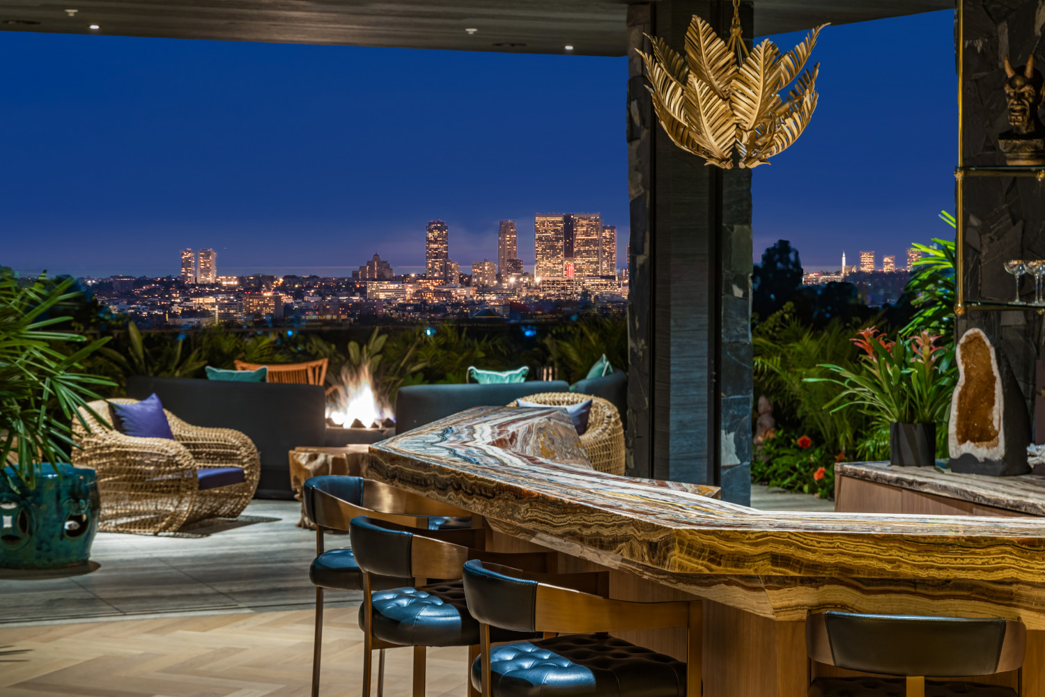 Open-air stone bar and lounge overlooking the Los Angeles skyline