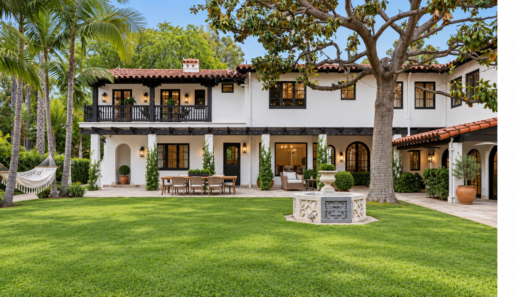 Rear Exterior with Lawn and Covered Patio