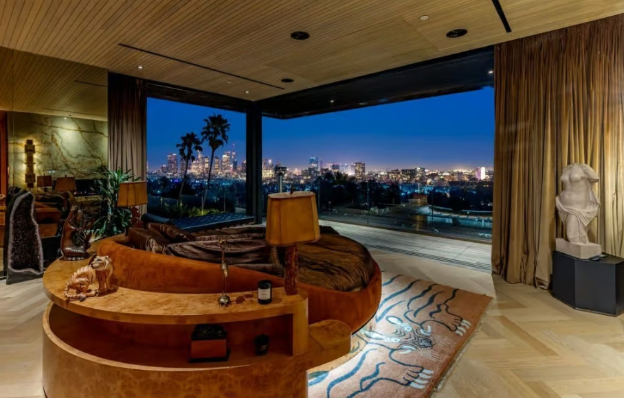 Luxury bedroom with floor-to-ceiling Los Angeles skyline views
