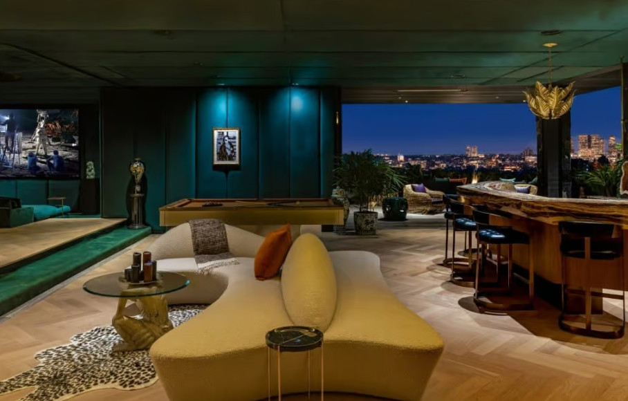 Open-air stone bar and lounge overlooking the Los Angeles skyline