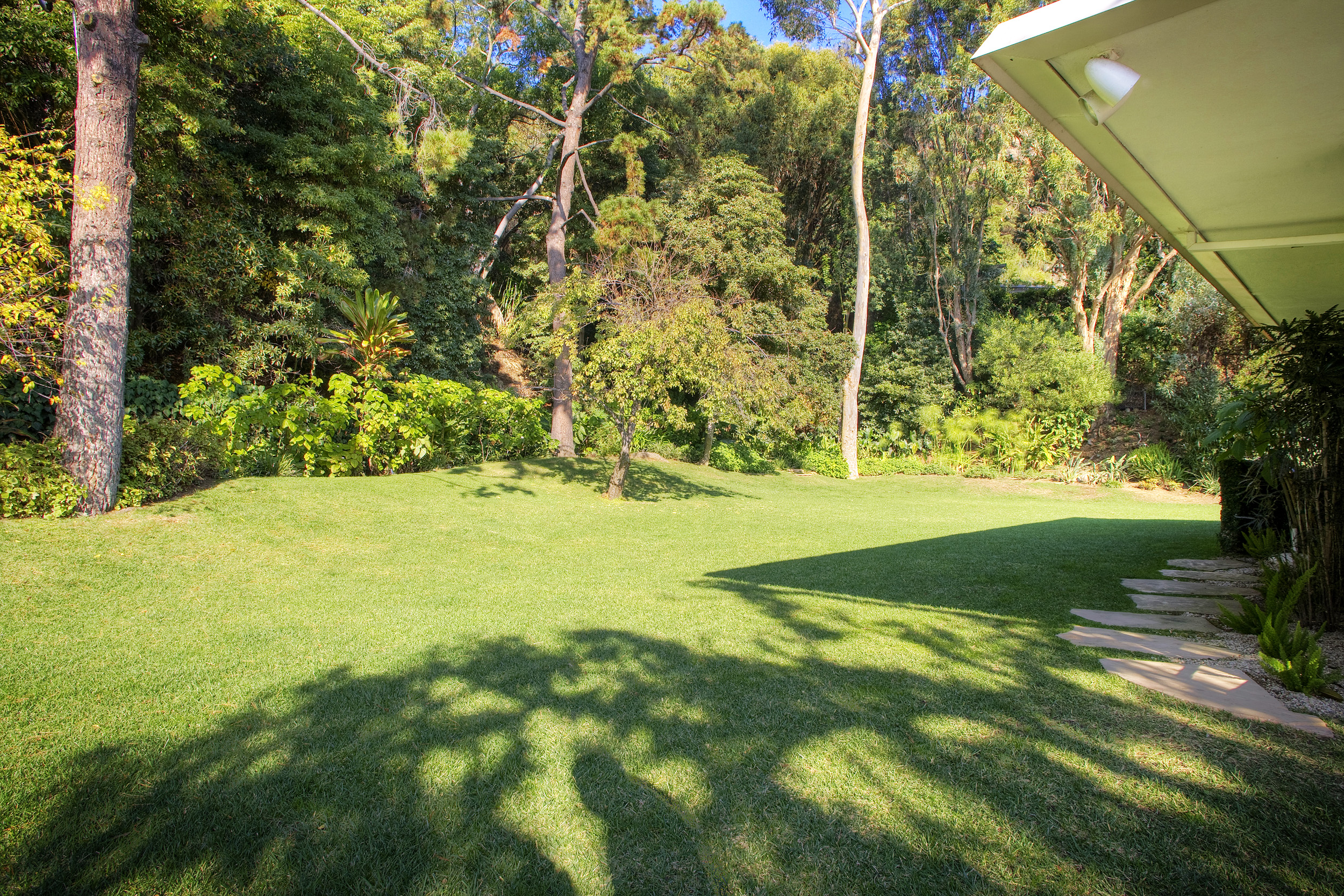 Expansive landscaped lawn at Beverly Hills private estate