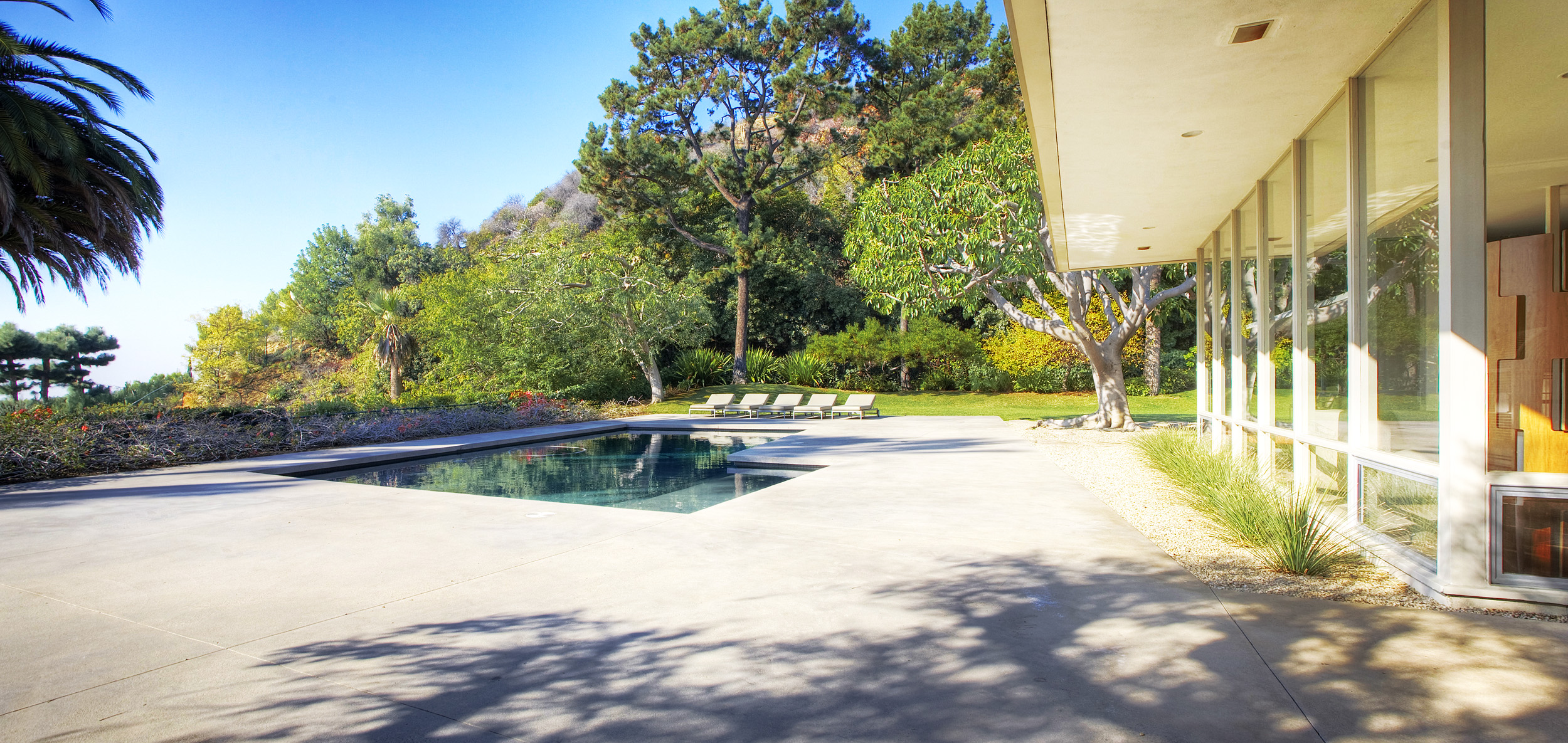 Landscaped gardens and pool at modern Beverly Hills private event home